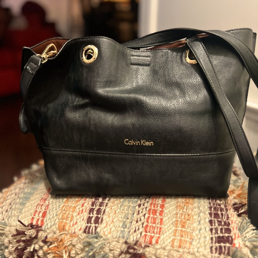 Calvin Klein bag, slightly worn reversible great for every day or work.
